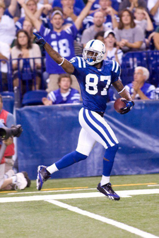 COLTS # 87 REGGIE WAYNE GETS BEHIND THE GREEN BAY DEFENSE TO CATCH THIS TOUCH DOWN PASS.