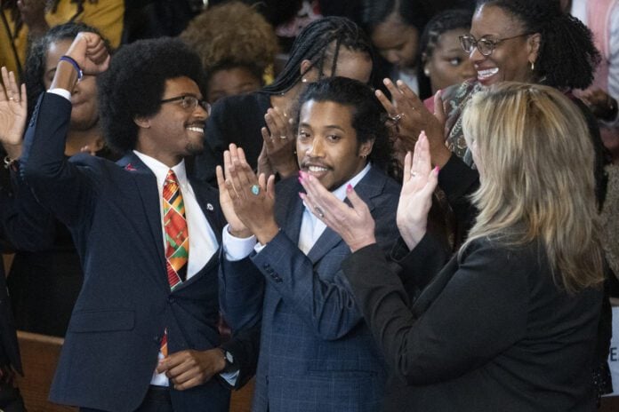 Harris Tennessee Lawmaker Expulsion Expelled Rep. Justin Pearson, D-Memphis, from left, expelled Rep. Justin Jones, D-Nashville, and Rep. Gloria Johnson, D-Knoxville, are recognized by the audience at Fisk University before Vice President Kamala Harris arrives, Friday, April 7, 2023, in Nashville, Tenn. (AP Photo/George Walker IV)