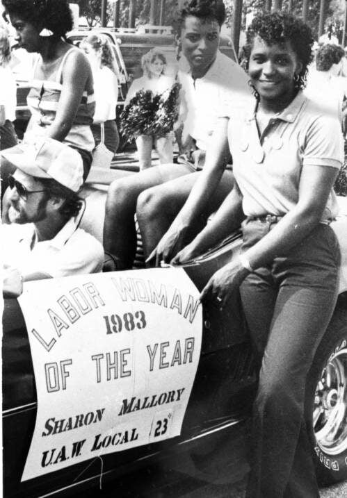 Sharon Mallory [right], recently voted as "Labor Woman of the Year for 1983," was one of many women participating in a Labor Day March downtown. (Photo/Indianapolis Recorder archives)