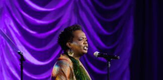 Manon voice, multi-hyphenated artist and educator, reciting spoken word poetry for the Women’s Fund of Central Indiana - The Power of Women (Photo provided/Manon voice)