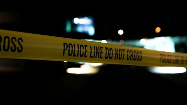 police tap to signify domestic gun violence