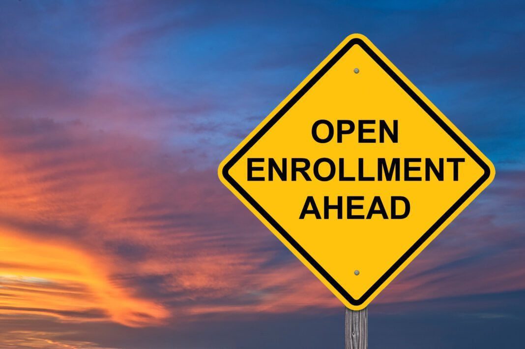Open Enrollment Ahead Caution Sign Sunset Background