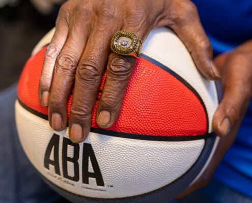 Dr. Dunk holding the ABA basketball during The Waiting Game.