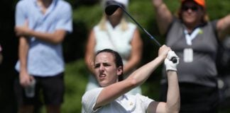 Caitlin Clark during a golf event.