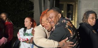 Family of Breonna Taylor embracing after court decision.