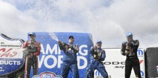 2024 Heisman winner Travis Hunter posing with the award.