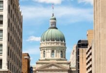 The Indiana Statehouse capitol building with blue sky behind. Indiana, USA.