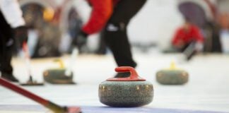 Curling stones on ice