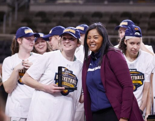 Green Bay's Natalie McNeal is named Most Valuable Player/Most Outstanding Player during the 2025 Horizon League Women's Basketball Tournament Championship on March 11, 2025 at the Corteva Coliseum in Indianapolis, Indiana. The award was presented to McNeal by Key Banks's Ivory Salmon.