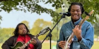 Khiry Managan (right) and Angel “Ocho” Ochoa (left) of the Indianapolis-based band Forgotten Tribe perform at the September 2024 Levitt VIBE Music Series concert.