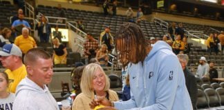 Indiana Pacers forward Myles Turner signing autographs for fans after the final home game of the 2024-25 NBA regular season on April 11, 2025 at Gainbridge Fieldhouse in downtown Indianapolis, Indiana. (Photo/David Dixon)