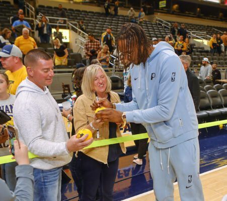 Indiana Pacers forward Myles Turner signing autographs for fans after the final home game of the 2024-25 NBA regular season on April 11, 2025 at Gainbridge Fieldhouse in downtown Indianapolis, Indiana. (Photo/David Dixon)
