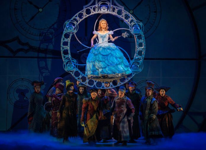 Zoe Jensen as Glinda (center) and the National Touring Company of WICKED, photo by Joan Marcus (0510r) Zoe Jensen as Glinda (center) and the National Touring Company of "WICKED," which is onstage at Old National Centre now through July 6. (Photo/Joan Marcus)