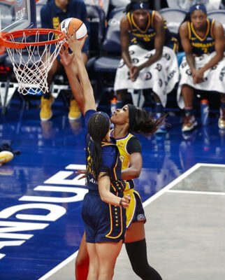 Fever forward Makay;a Timpson (21) gets the contested shot during the Los Angeles Sparks versus Indiana Fever WNBA game on July 5, 2025, at Gainbridge Fieldhouse, in downtown, Indianapolis, Indiana. (Photo/David Dixon)