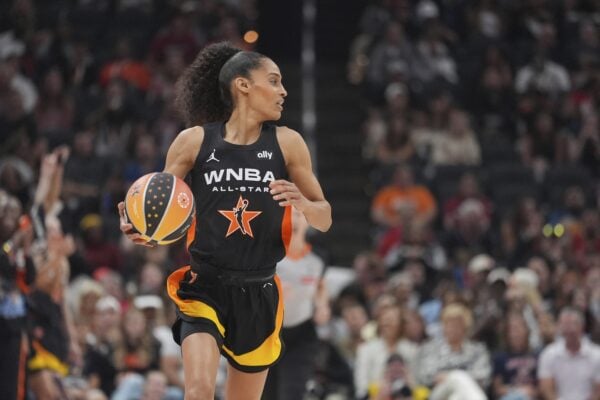 Skylar Diggins during the 2025 WNBA All-Star Game in Indianapolis, Indiana at Gainbridge Fieldhouse dripping the ball up the basketball court.