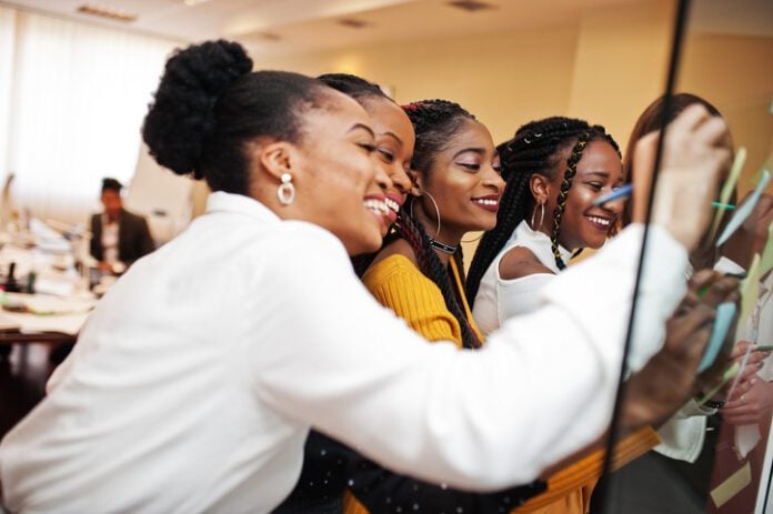 Diverse business people on a meeting Girls for Christ, a youth empowerment conference started by Roberta Thorpe, is back after 20 years. (Photo/Getty Images)