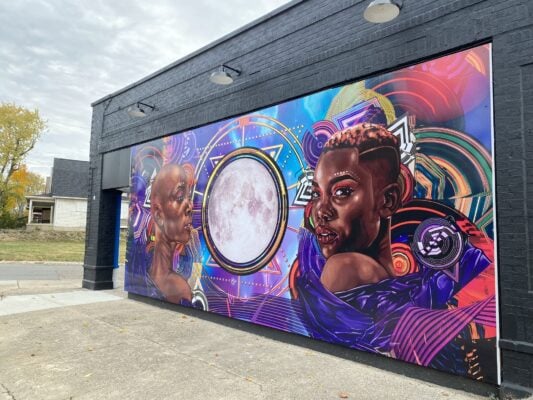 The mural on the side of Cleo’s Bodega was designed by Hoosier muralist Tasha Beckwith (Photo provided/Tasha Beckwith)