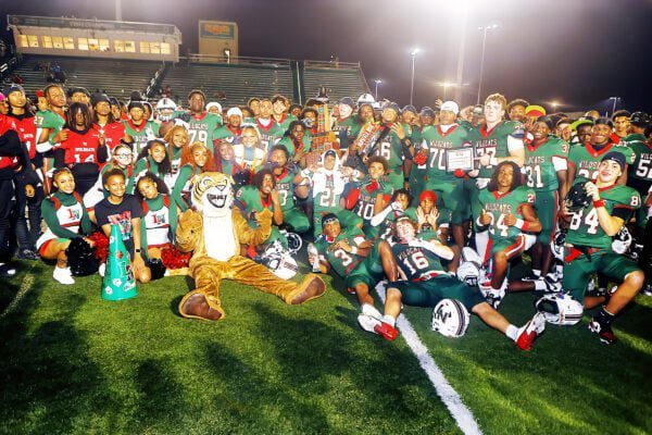 Lawrence North High School takes home the Battle For the Bell trophy as well as the Great American Rivalry Series trophy in a 34-27 win over Lawrence Central High School. (Photo/David Dixon)
