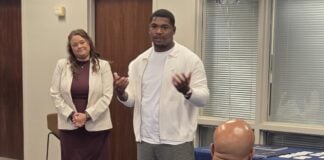 Business owner Curtis Collins (right) and Chase Bank business consultant Shellie Vernon (Left) during the Coaching for Impact program graduation on August 21, 2025 at Chase Bank in Indianapolis, Indiana. (Photo provided/Chase Bank)