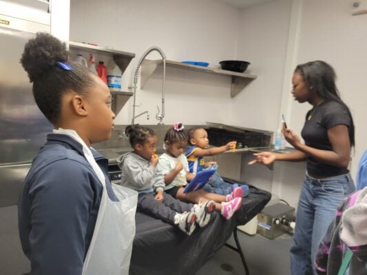 2025 Cooking Workshop and Lead Prevention community event held at Douglass Park to teach community members how to combat lead absorb ion with certain meals.