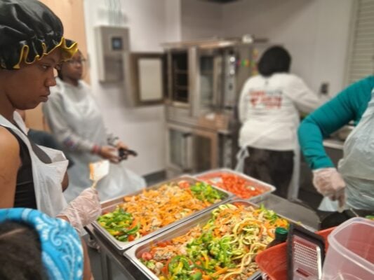 2025 Cooking Workshop and Lead Prevention community event held at Douglass Park to teach community members how to combat lead absorb ion with certain meals.