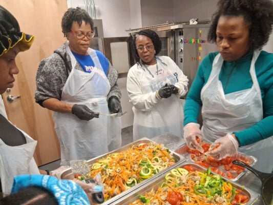 2025 Cooking Workshop and Lead Prevention community event held at Douglass Park to teach community members how to combat lead absorb ion with certain meals.