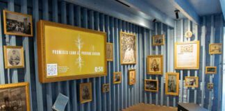 Photos from the Indiana Historical Society and Library of Congress adorn the walls of the Resistance Cabin, painted a haint blue to honor the spiritual connection African American Hoosiers had.