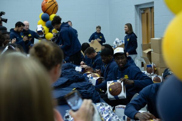 Indiana Pacers players and staff interacting with the community at the event held at Haughville Park in Indianapolis.