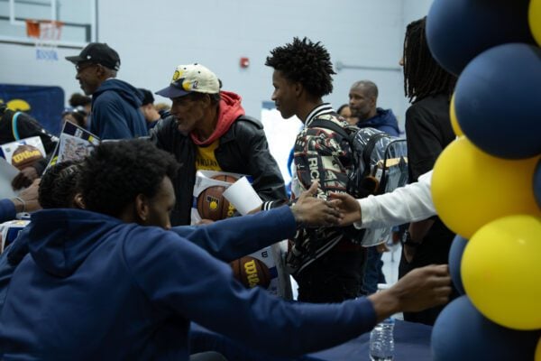 Indiana Pacers players and staff interacting with the community at the event held at Haughville Park in Indianapolis.