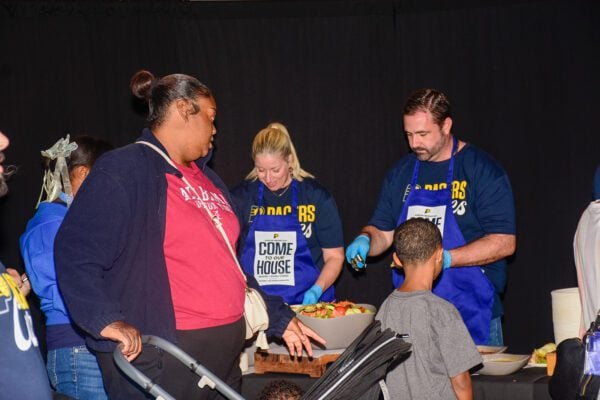 Pacers Sports & Entertainment (PS&E) Community event, feeding members of the Indianapolis community, in November of 2025 at Gainbridge Fieldhouse. Photo taken by Tiffany Nmose.
