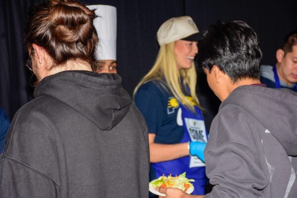 Pacers Sports & Entertainment (PS&E) Community event, feeding members of the Indianapolis community, in November of 2025 at Gainbridge Fieldhouse. Photo taken by Tiffany Nmose.