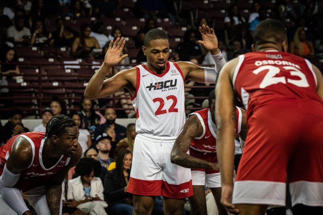 College basketball player during the HBCU All-Star Game with hands up in April of 2023 in Houston, Texas.