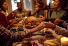 Community Arts Calendar: Thanksgiving and other November happenings Close of kids saying grace while having Thanksgiving dinner with their family at dining table. (Photo/Getty Images)
