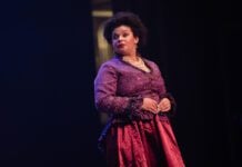 Indianapolis Recorder Arts & Culture Reporter Chloe McGowan starring in the Disney musical "Newsies" as Medda Larkin in November of 2025 in Indianapolis, Indiana.