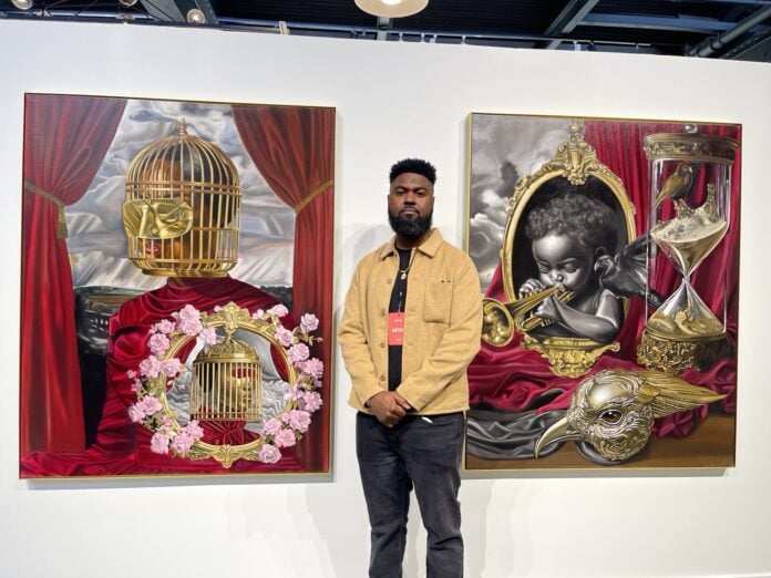 Marcus Robins, a tattoo artist turned oil painter, was a first-time exhibiting artist at BUTTER 5. (Photo/Camike Jones)