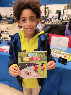 Justin Leonard, 10, is the co-author of “That’s My Thing.”