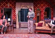 Detective Sergeant Trotter (Scot Greenwell), center, questions the suspects at Monkswell Manor in Beef & Boards Dinner Theatre’s production of Agatha Christie’s “The Mousetrap.”