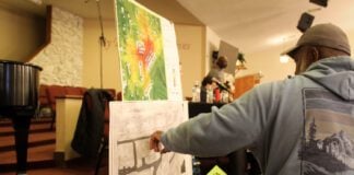 WFYI photo of a community meeting in martindale brightwood concerning the construction of data centers in indianapolis.