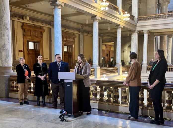 Representatives from a bipartisan coalition of more than 25 organizations, including Indiana Community Action Poverty Institute (ICAPI), gathered on Feb. 11 at the Indiana Statehouse in support of legislation to protect Hoosiers from harmful impacts of medical debt. (Photo/Chloe McGowan)