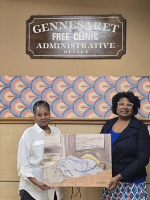 Mattie Jones presents her painting to Executive Director Miliele Kennedy, purchased by Gennesaret founder Dr. James Trippi. (Photo provided/Mattie Jones)